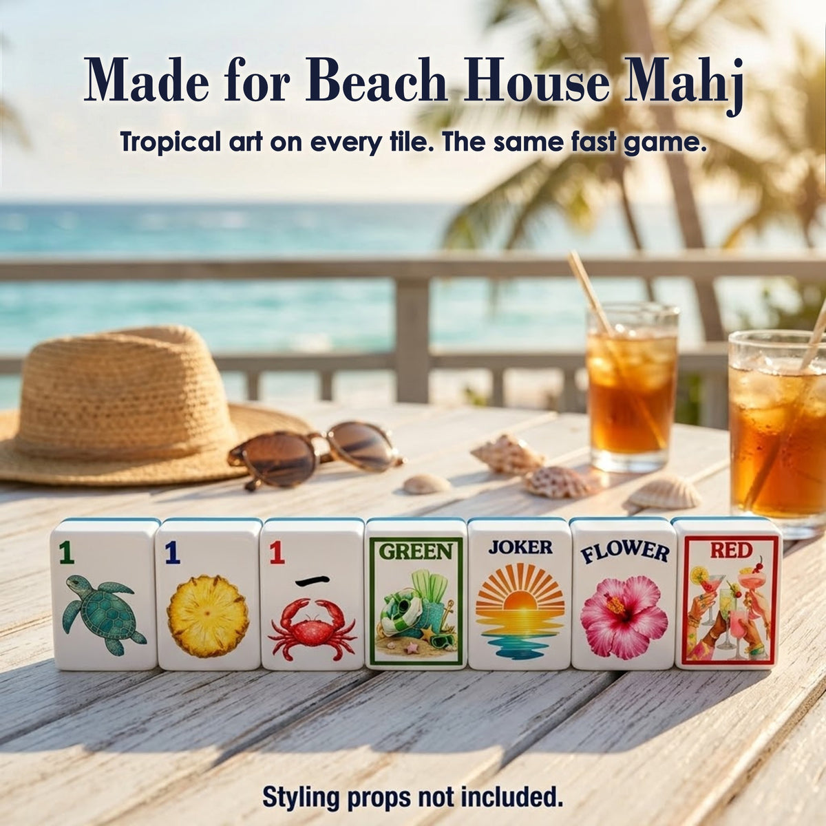 Seven Beach mahjong tiles on a deck table by the ocean: 1 Bam, 1 Dot, 1 Crak, GREEN, Joker, Flower and RED