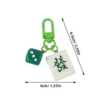 One tile charm with its size: 2.5 in long, 1.6 in wide