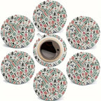 Round wooden coasters printed with mahjong tiles around a cup of coffee