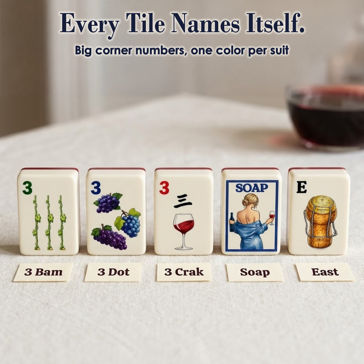 Wine mahjong tiles with corner numbers: green 3 Bam, blue 3 Dot, red 3 Crak, wine lady SOAP, cork East wind